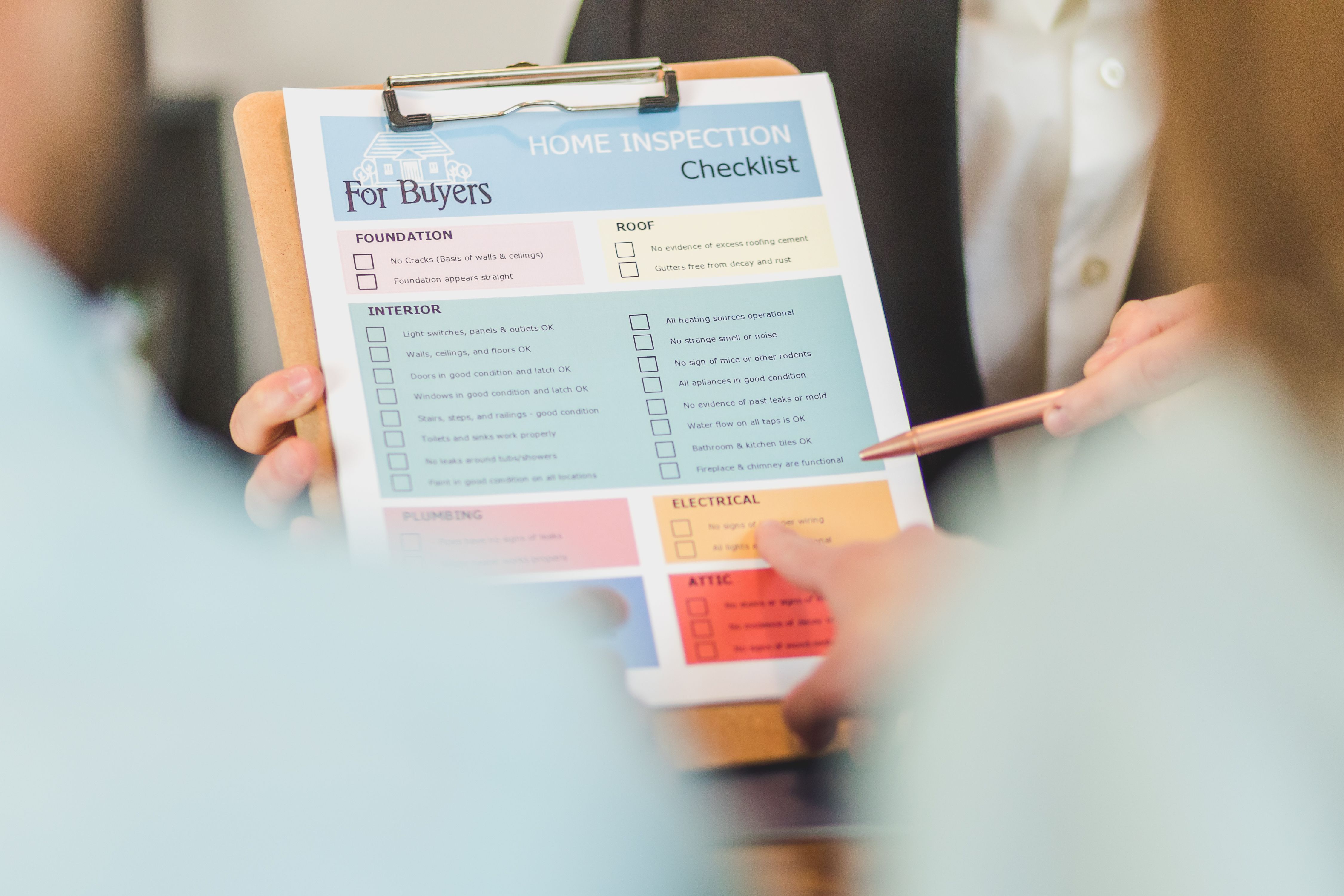 Small business owner reviewing a printed checklist on a clipboard, representing a carbon accounting checklist