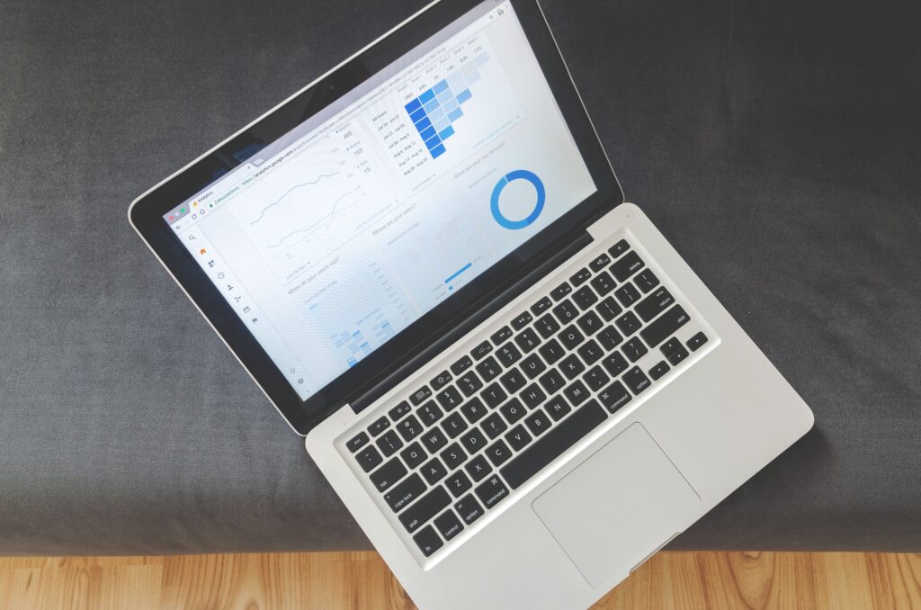 Laptop screen showing a data reporting dashboard used to evaluate carbon accounting tools