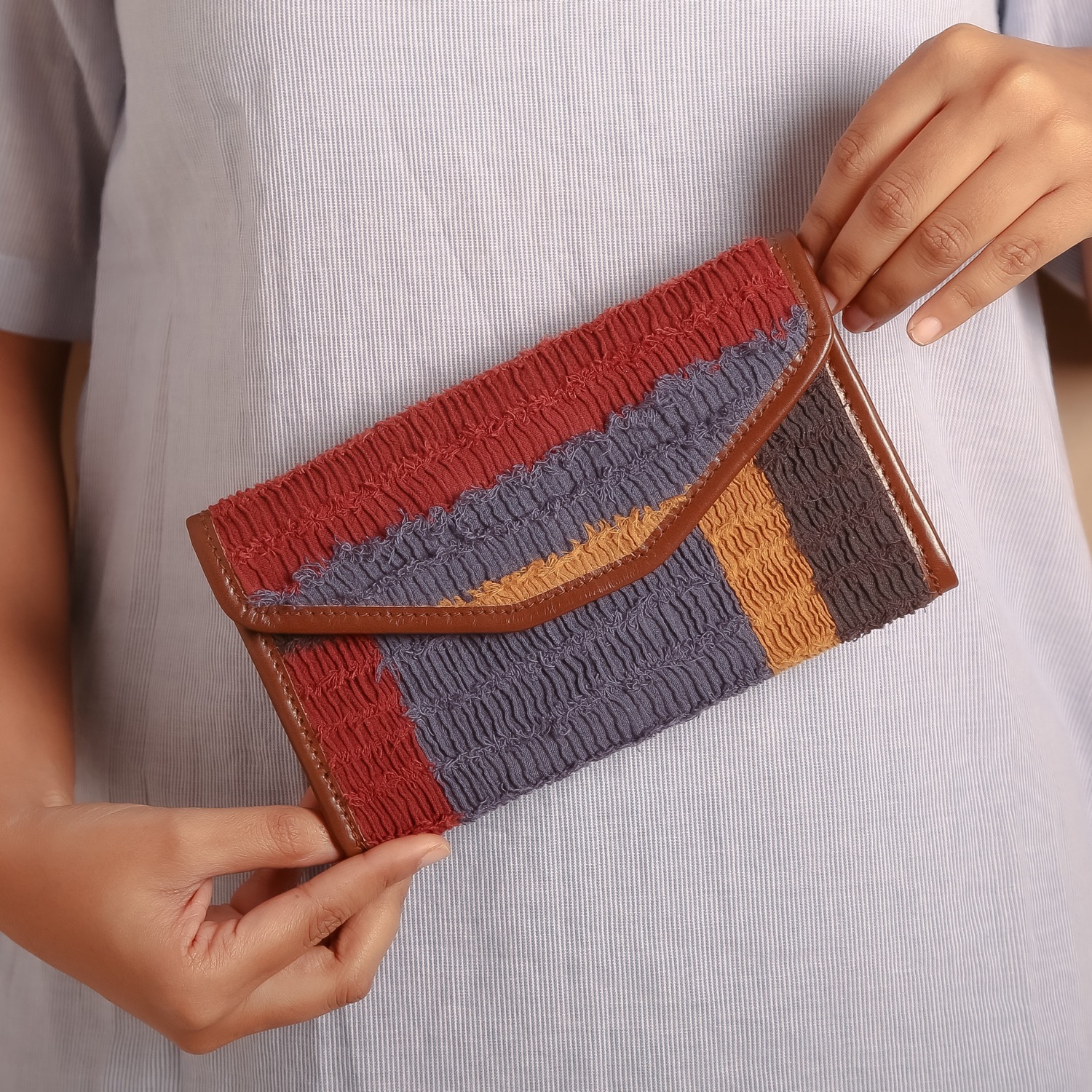 Doodlage textured clutch made from upcycled fabric waste