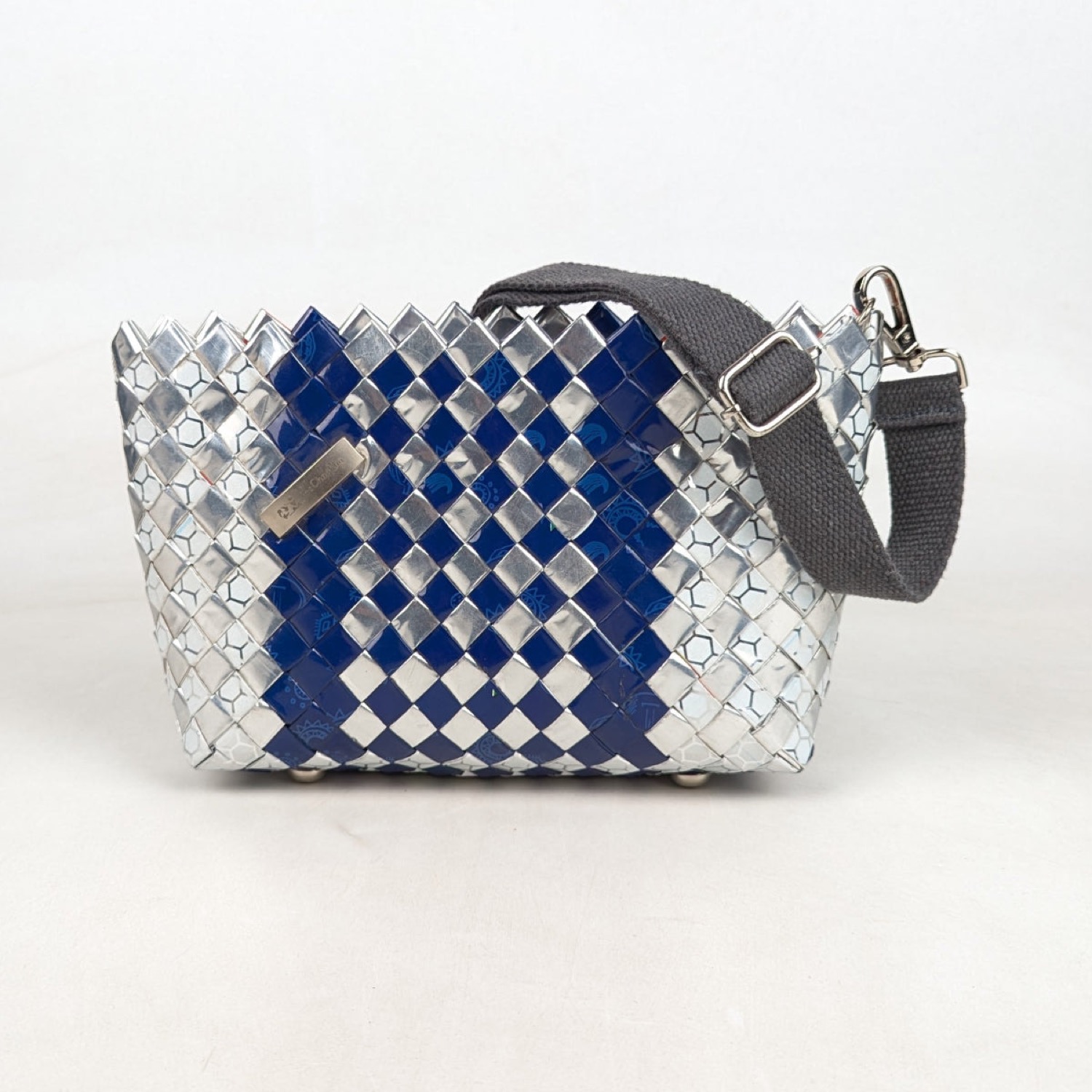 reCharkha origami sling bag handwoven from upcycled plastic wrappers