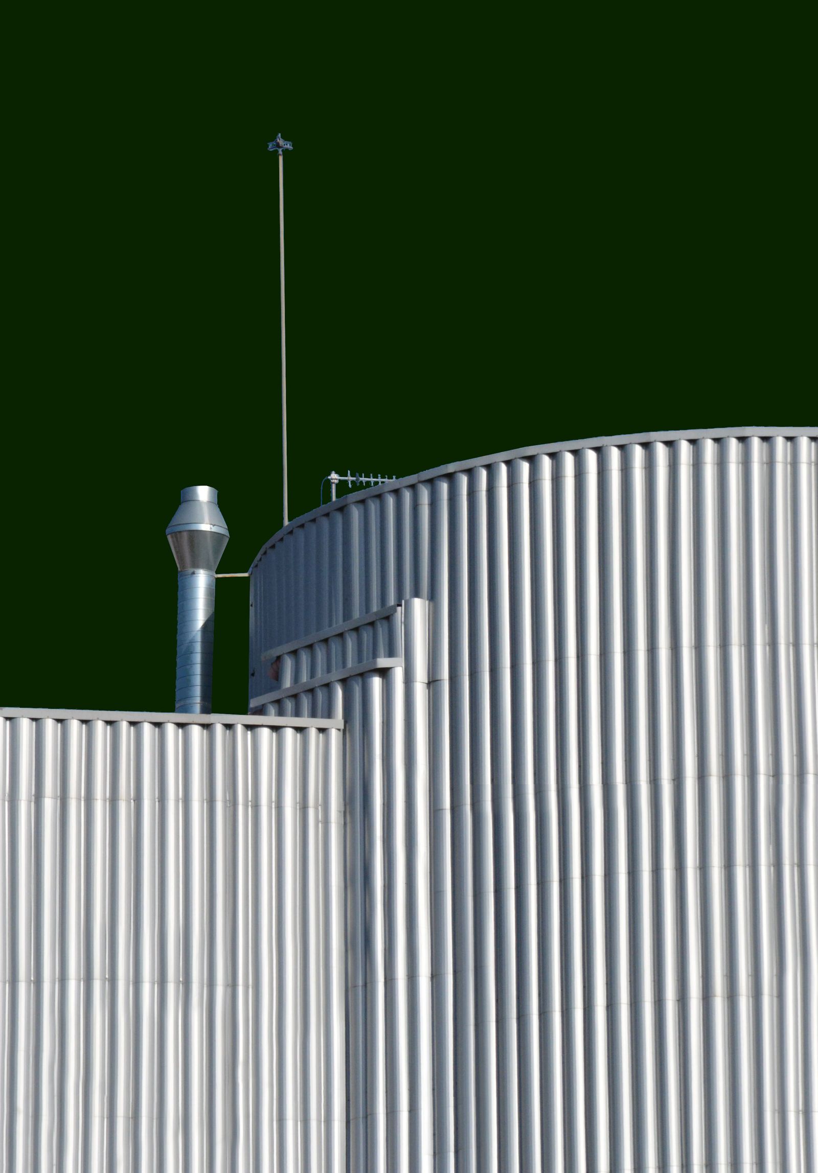 Cylindrical biogas digester tank at a compressed bio-gas (CBG) plant
