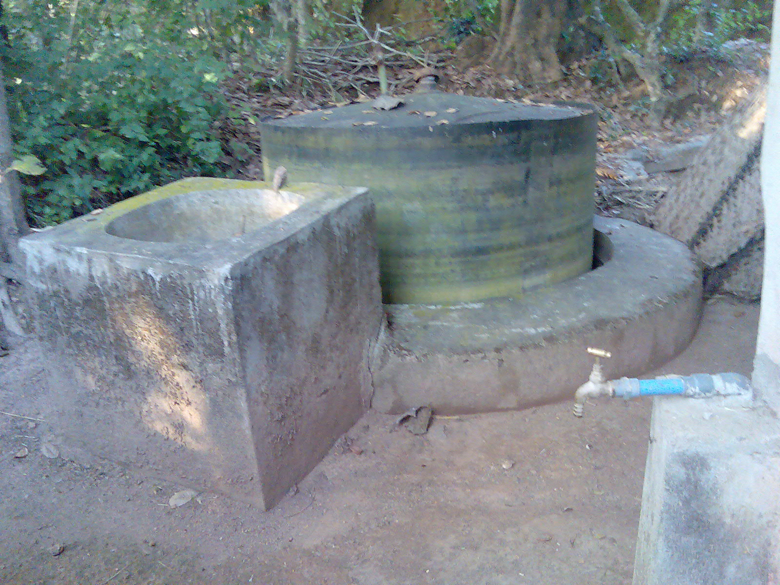 A gobar gas (cattle dung biogas) plant facility in rural India