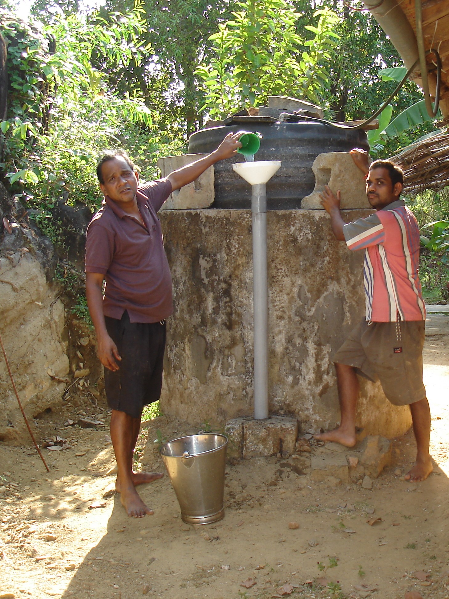 A small household biogas digester built in a rural courtyard using kitchen and organic waste