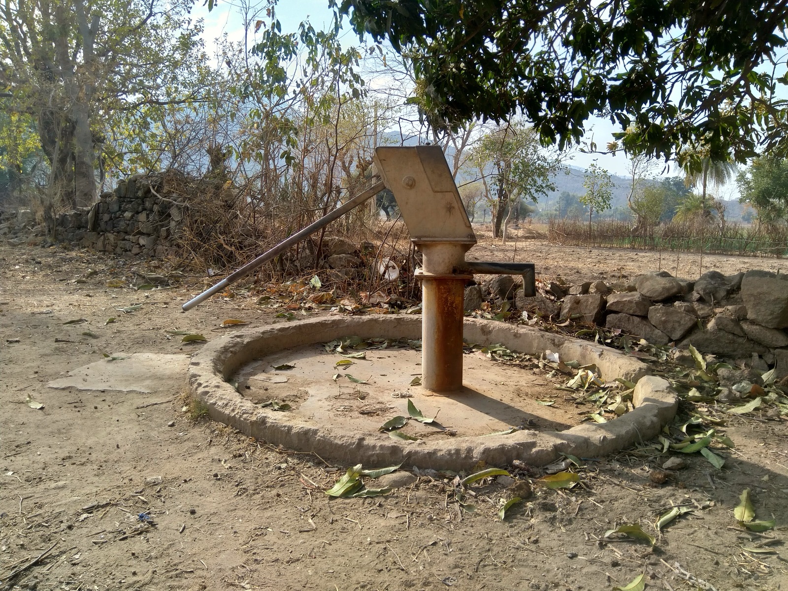 India Mark II hand pump drawing groundwater in a rural village in Rajasthan, India