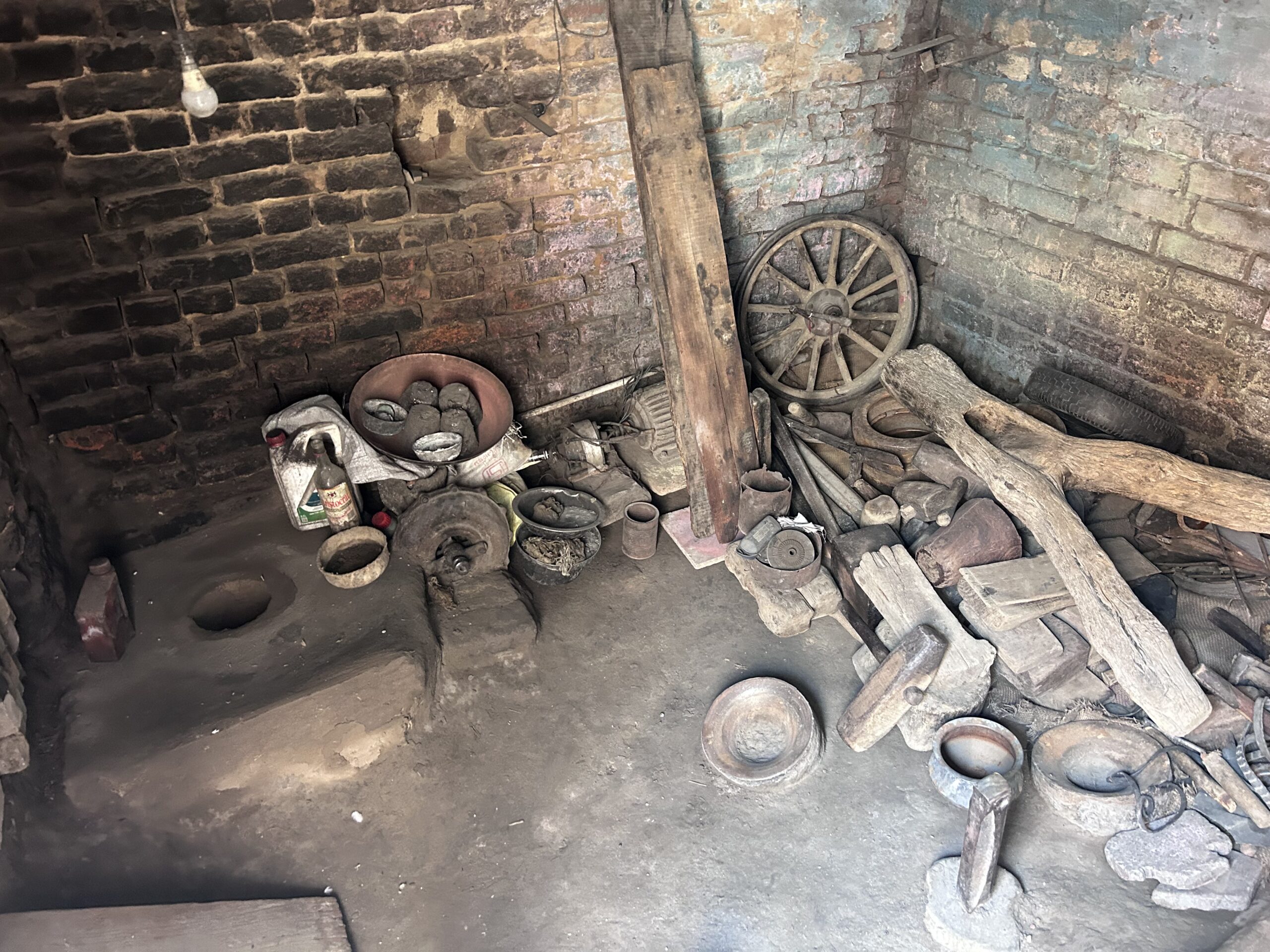Tools and equipment inside a small-scale traditional manufacturing workshop in India