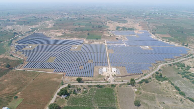 Aerial view of a utility-scale solar power plant in Telangana, India