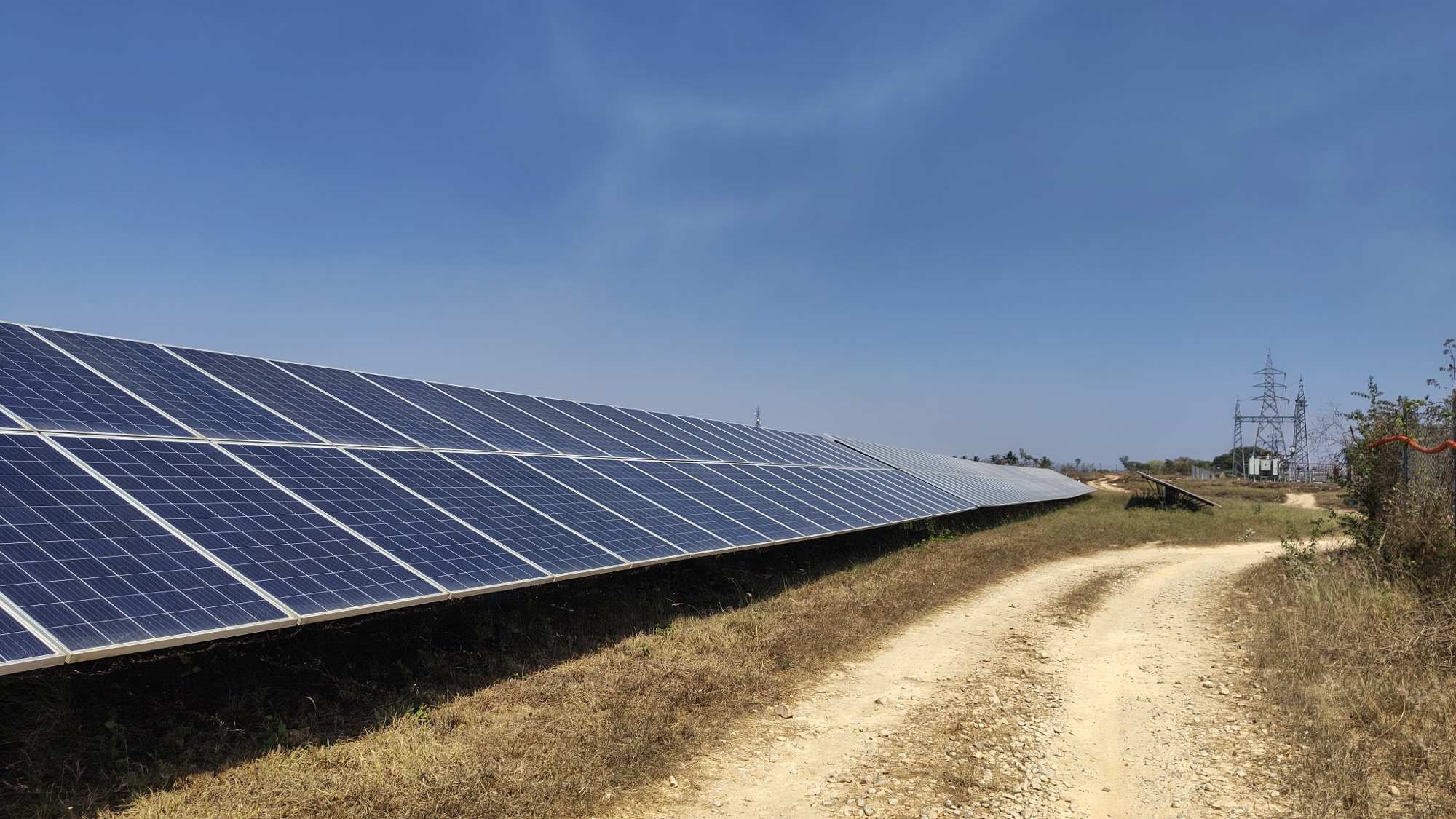 Solar panel array connected to grid infrastructure in India