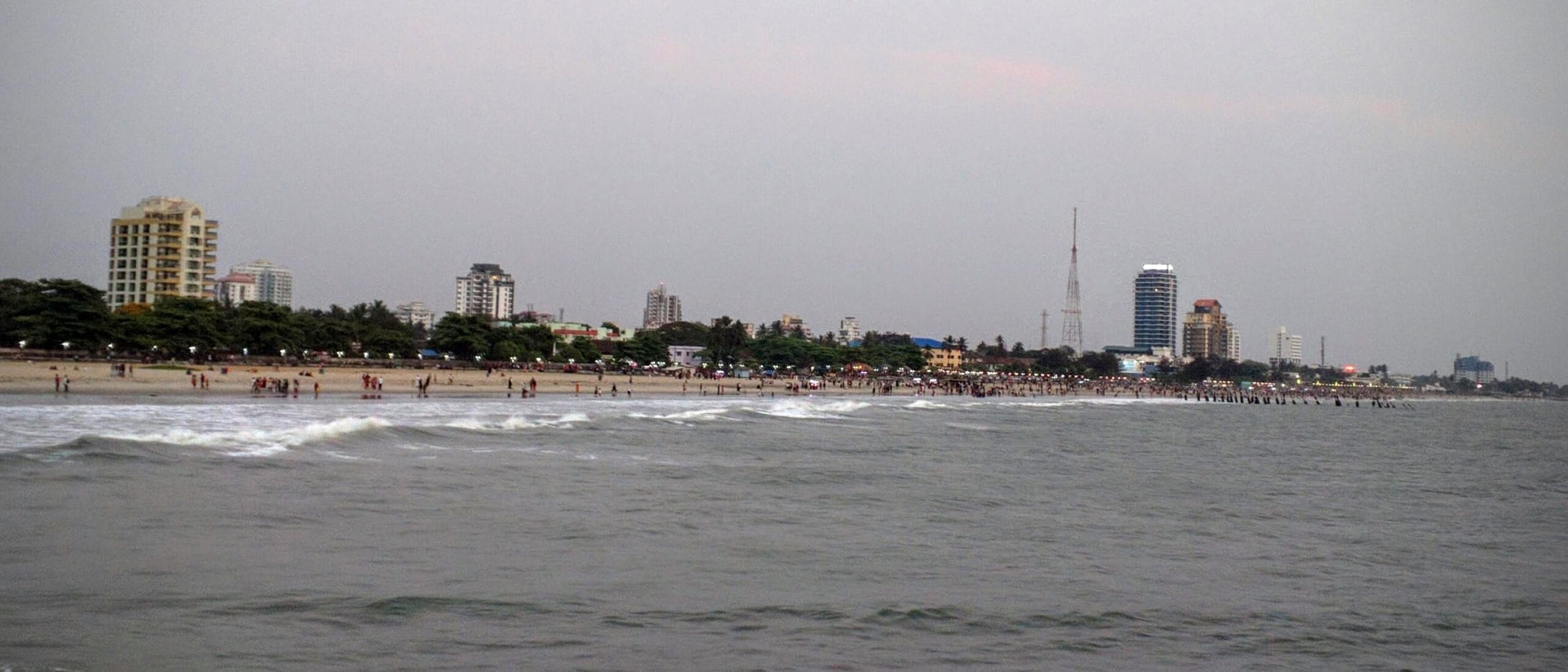 Wide view of a clean Indian beach coastline at Kozhikode, Kerala