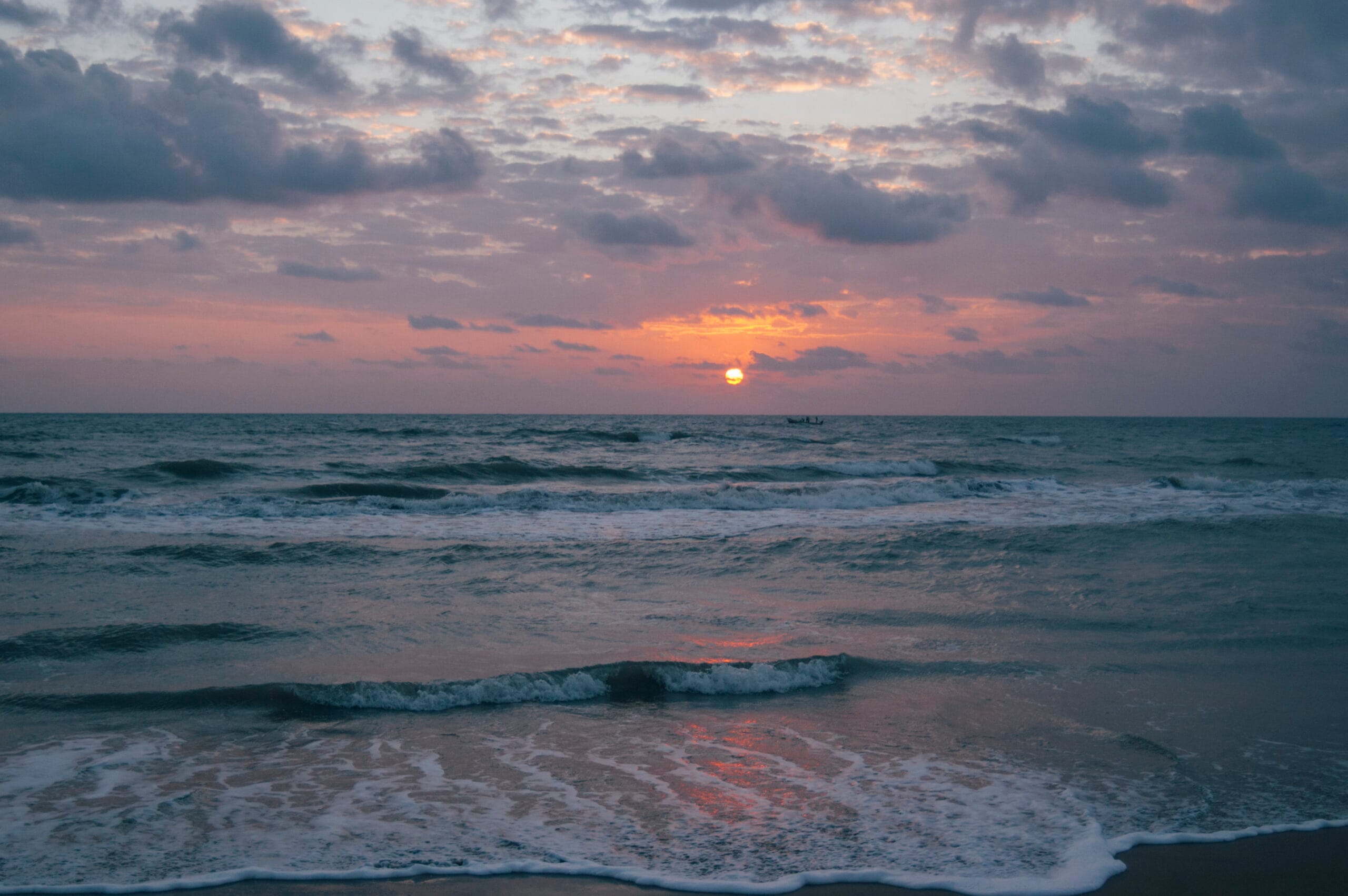 Sunrise over the Bay of Bengal at Nagapattinam Beach, representing India's coastline