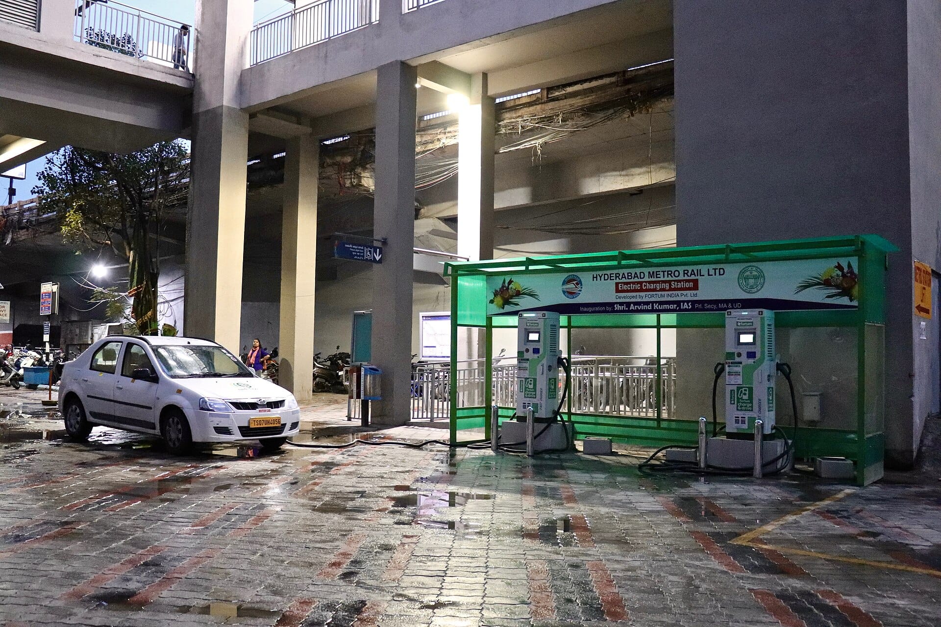 Public electric car charging station at a Hyderabad metro stop, an example of the EVs that earn super credits under CAFE-III