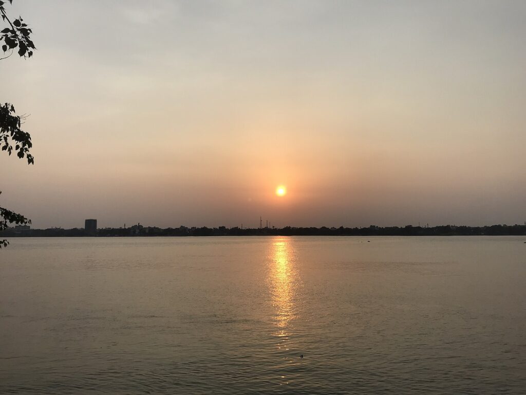 The Ganga river at sunset, where Namami Gange industrial pollution compliance work aims to cut effluent at the factory gate