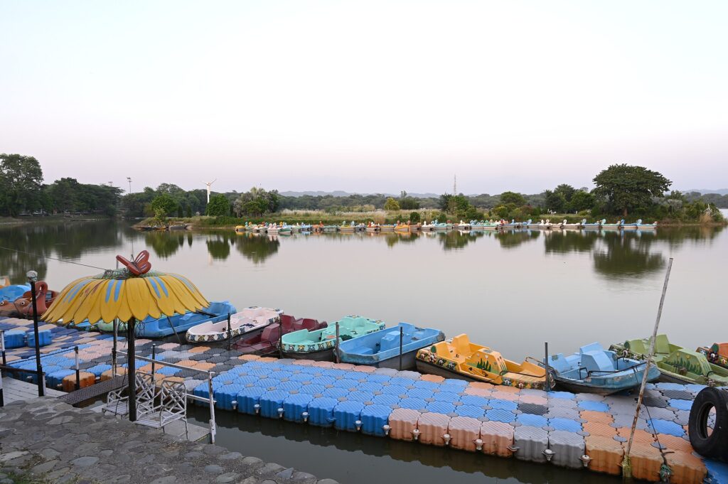 Evening view of Sukhna Lake in Chandigarh with the Shivalik foothills