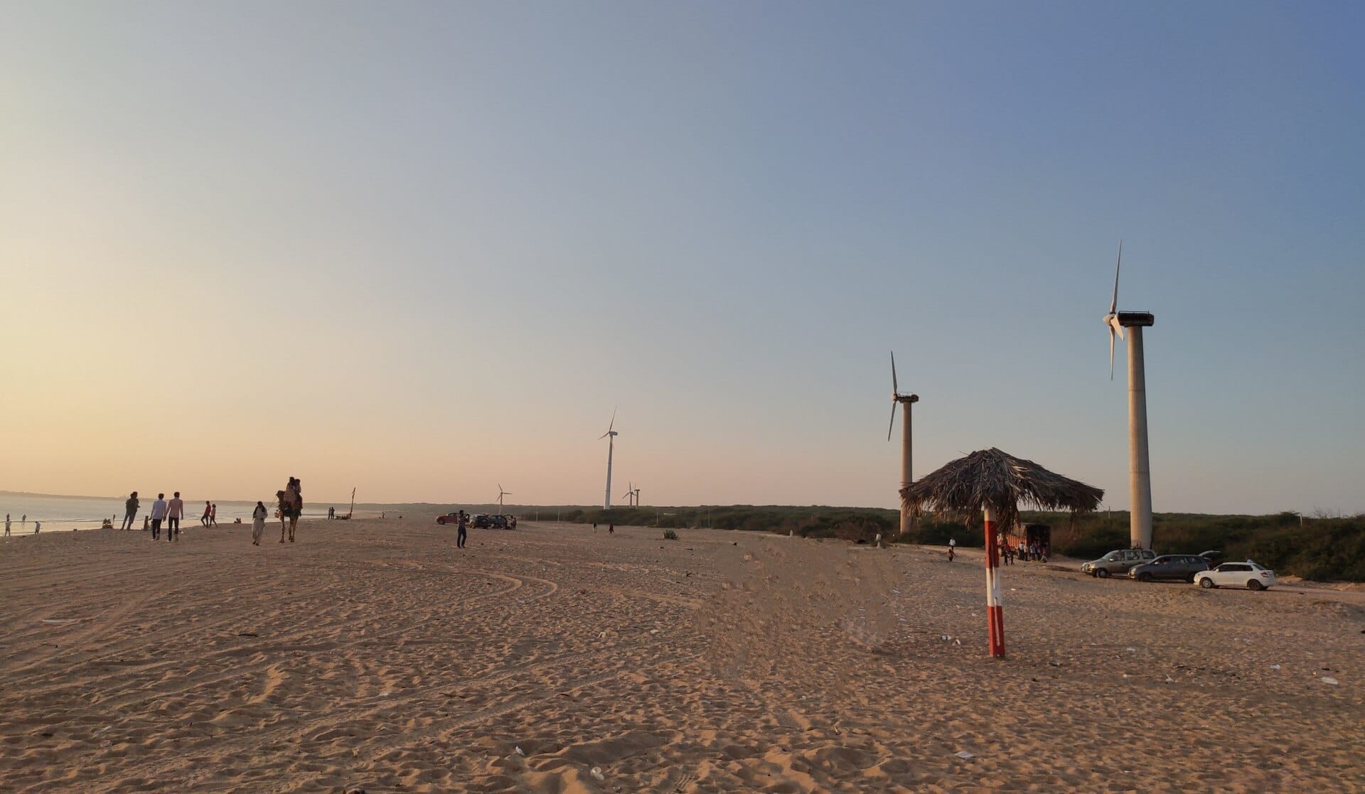 Wind turbines near a beach on the Kutch coast in Gujarat